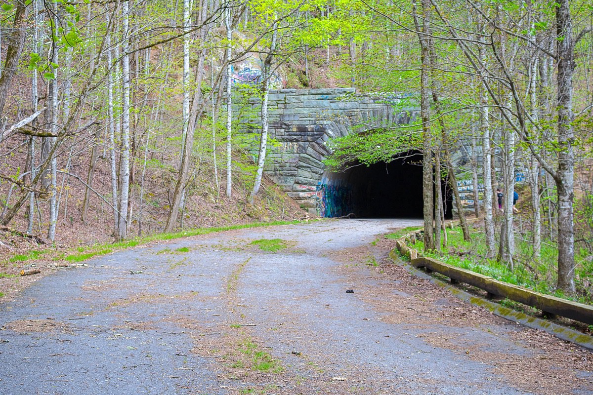 long dark deep tunnel along the road to nowhere leading to Goldmine loop trail